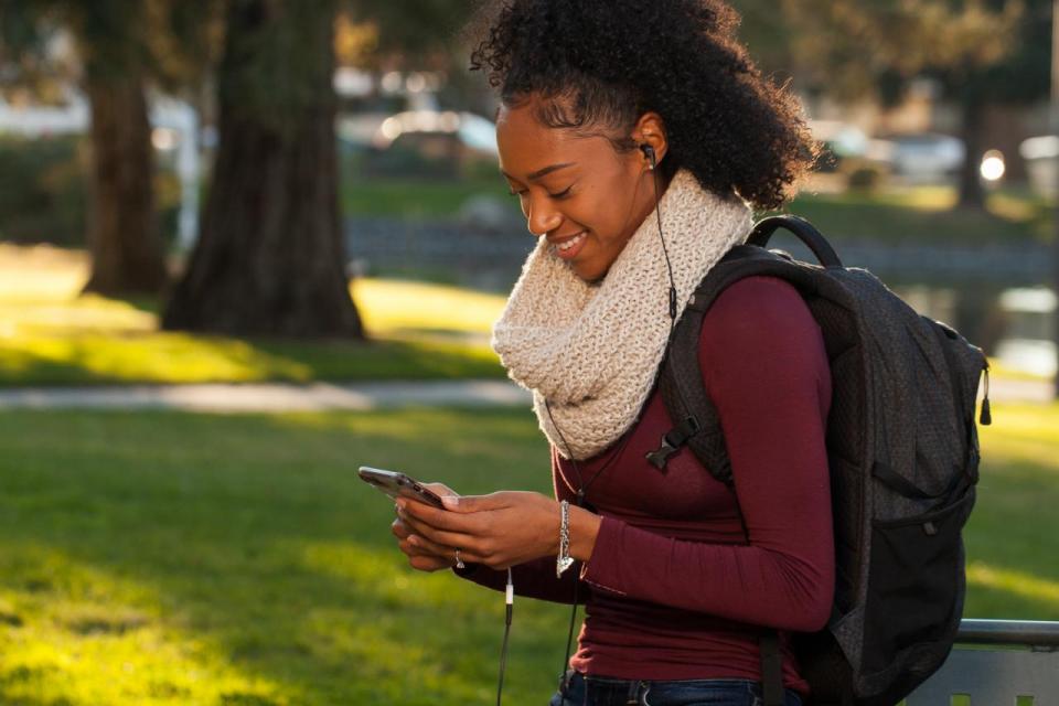 Student listening to podcast